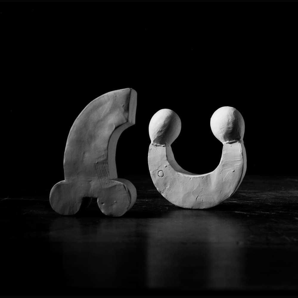 Porcelain carvings from the "Clay Pigeon" Series #7