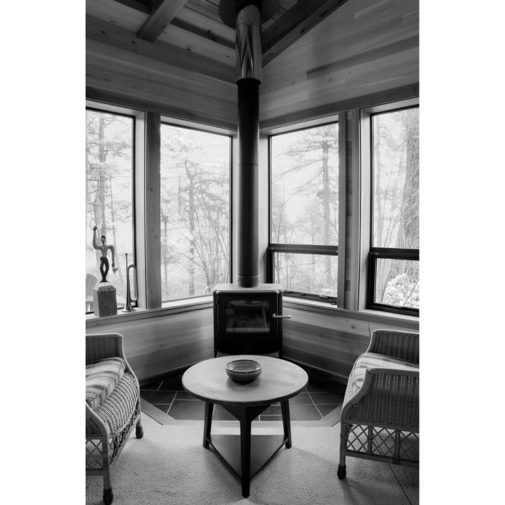 Wood fireplace in island cabin